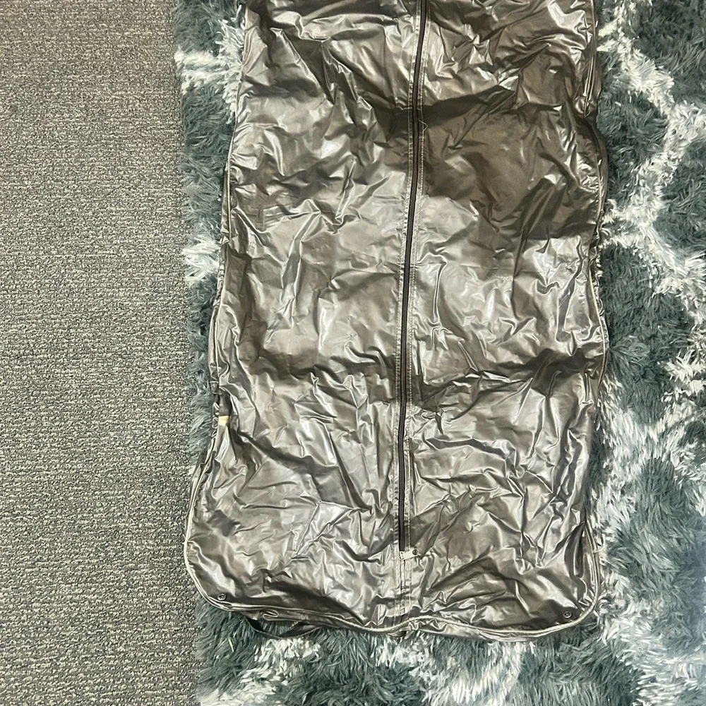 Vinyl garment bag Alexander McQueen